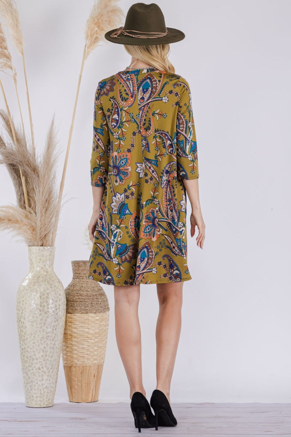 Celeste full size paisley print round neck dress with pockets