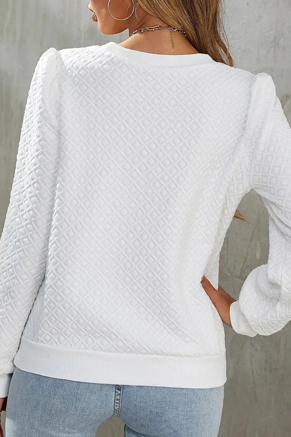 Textured round neck long sleeve top