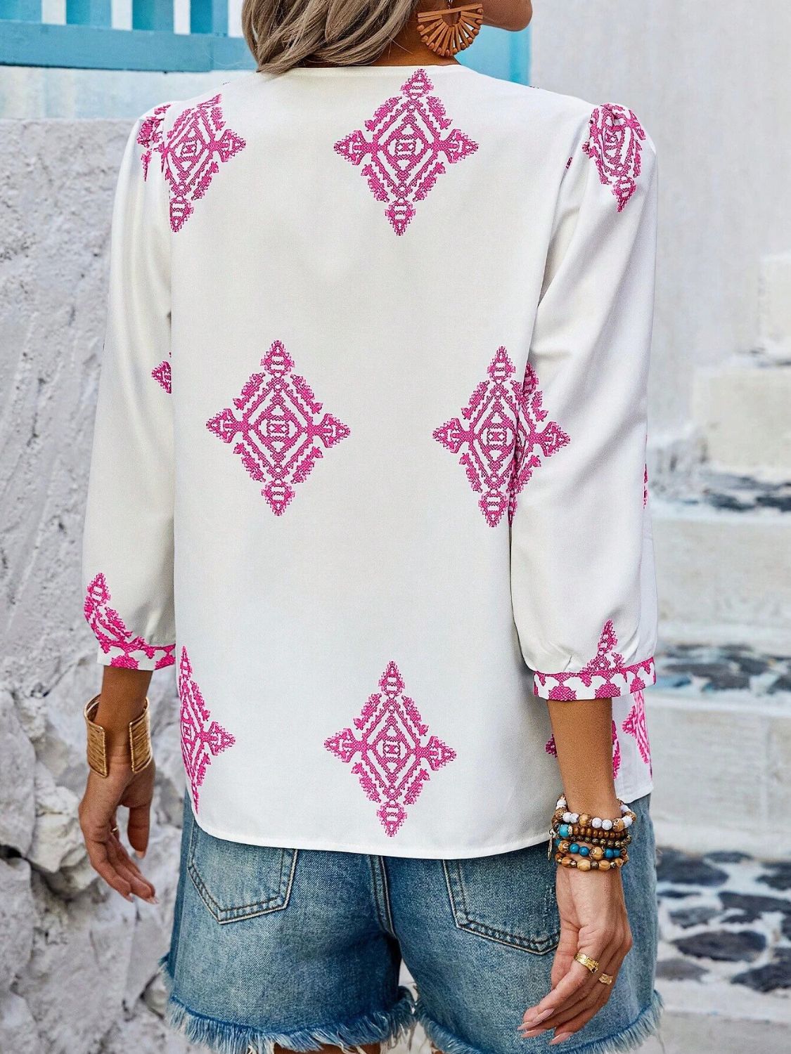 Printed v-neck three-quarter sleeve blouse