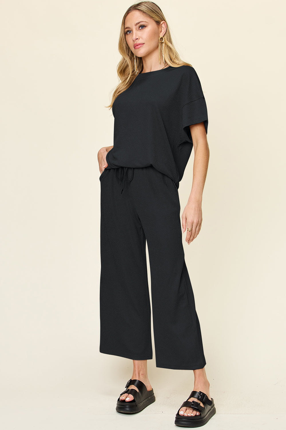 Double take full size texture round neck short sleeve t-shirt and wide leg pants