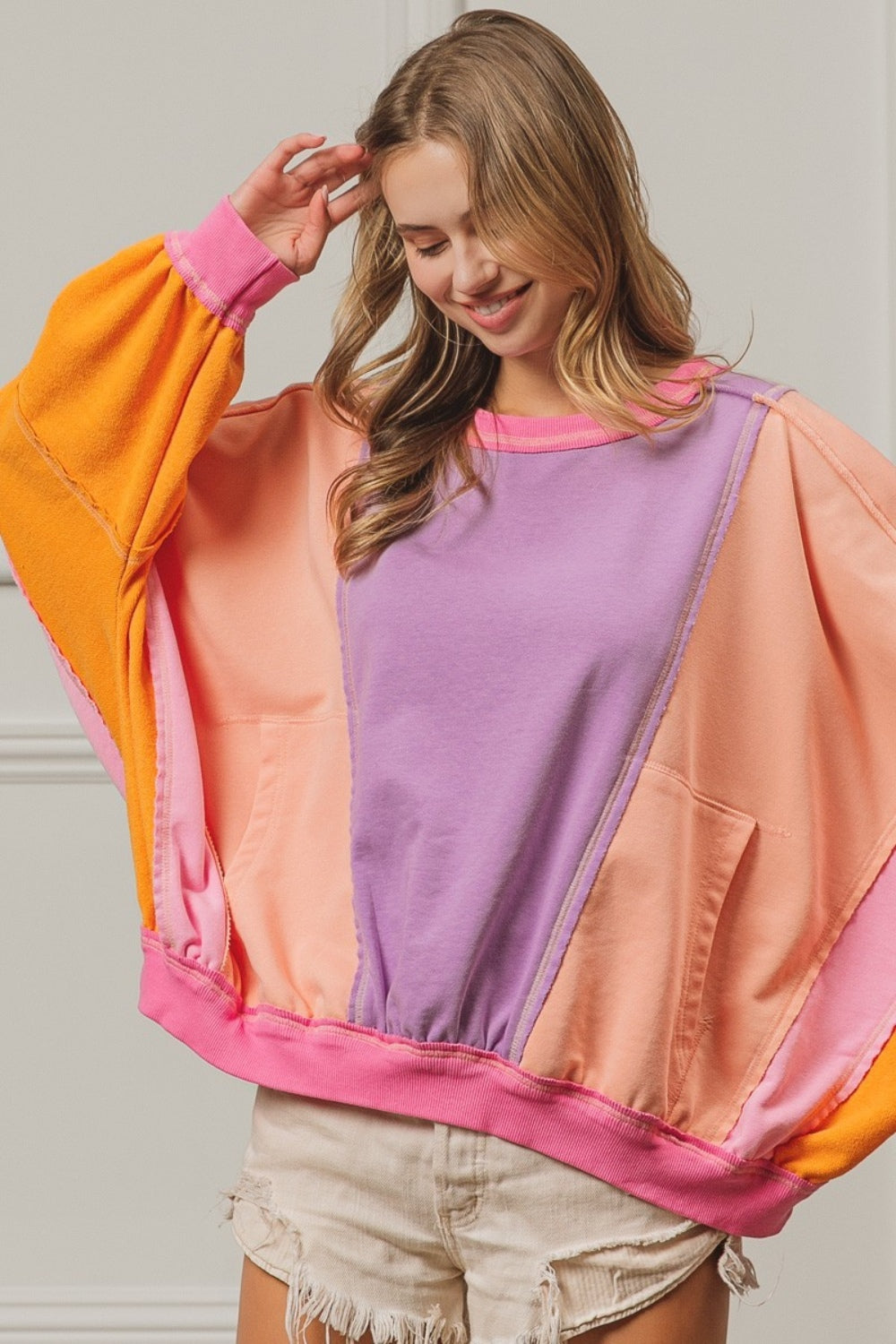 Bibi color block exposed seam sweatshirt with pockets