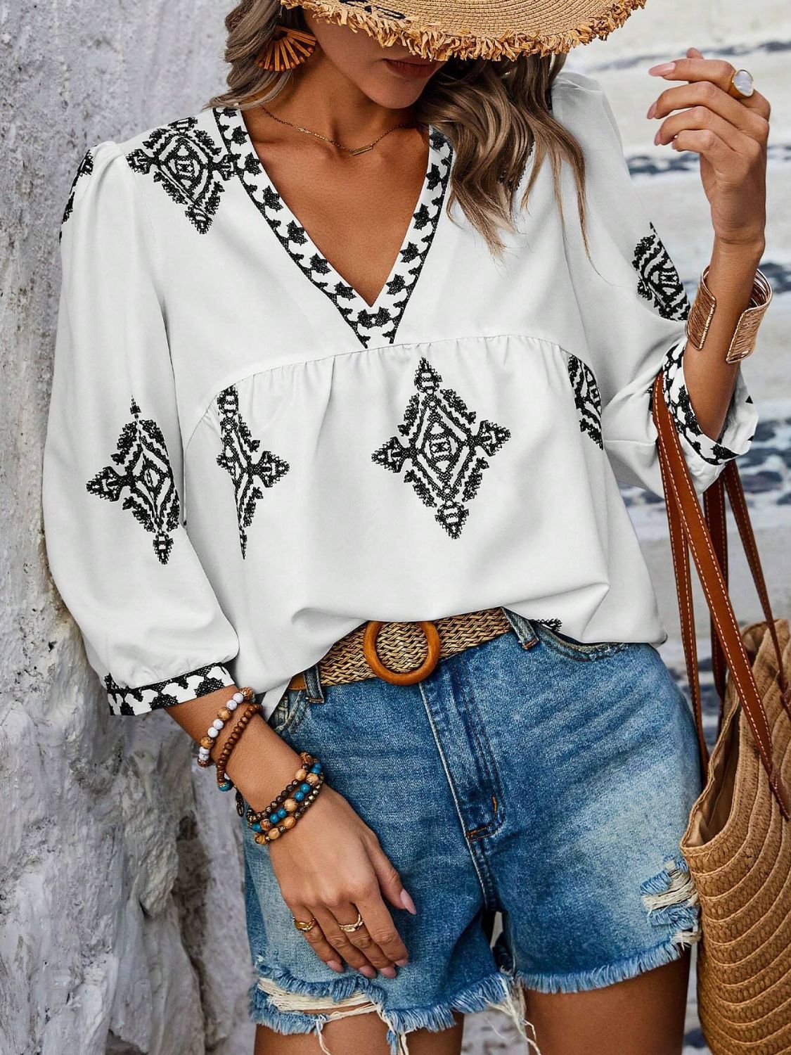 Printed v-neck three-quarter sleeve blouse