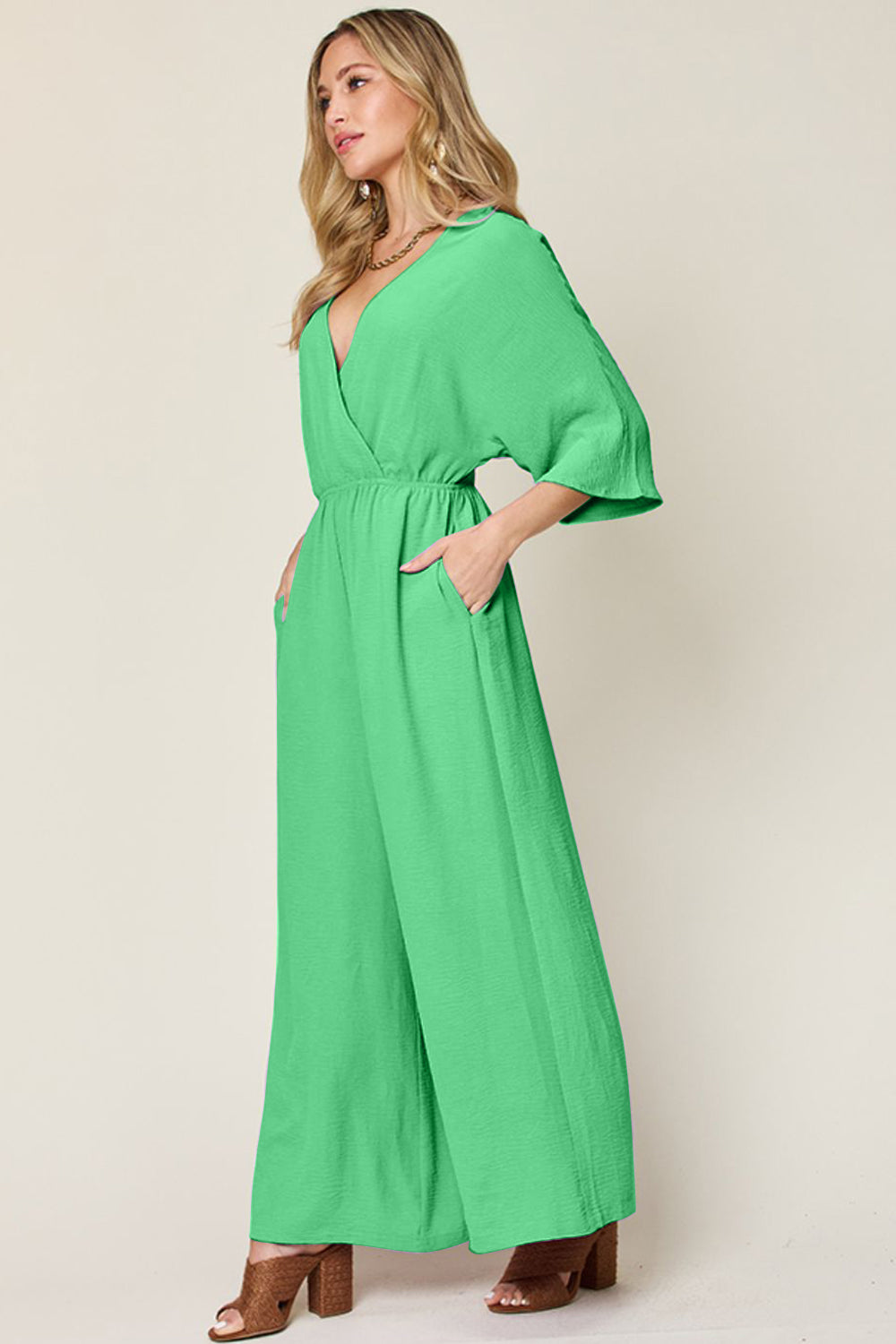 Double take full size surplice wide leg jumpsuit with pockets - mid green / s