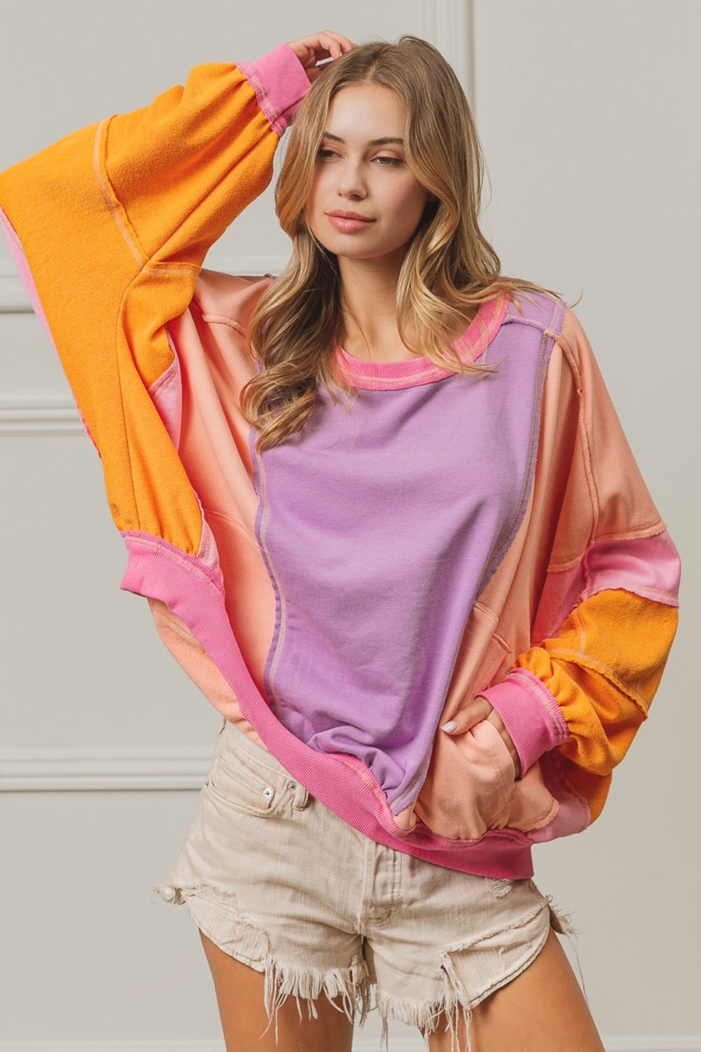 Bibi color block exposed seam sweatshirt with pockets