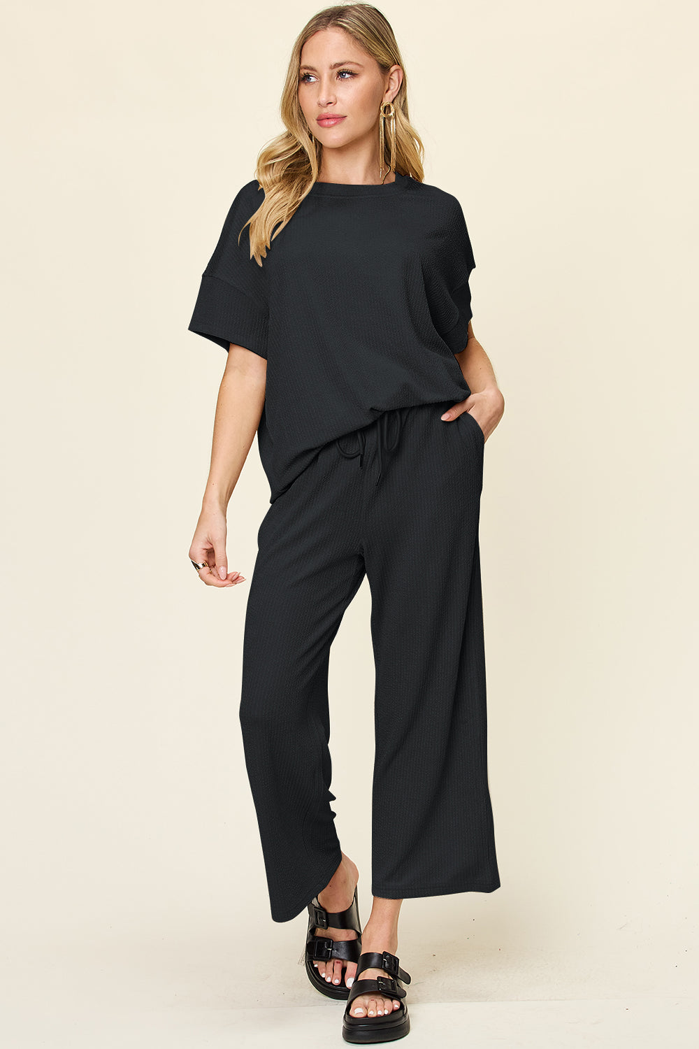 Double take full size texture round neck short sleeve t-shirt and wide leg pants - black / s