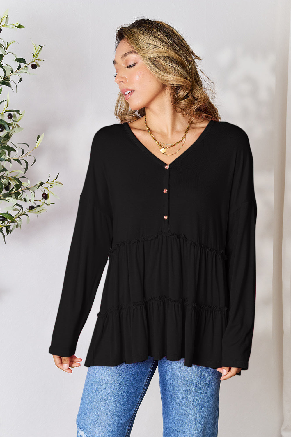 Double take half button long sleeve ruffle hem blouse