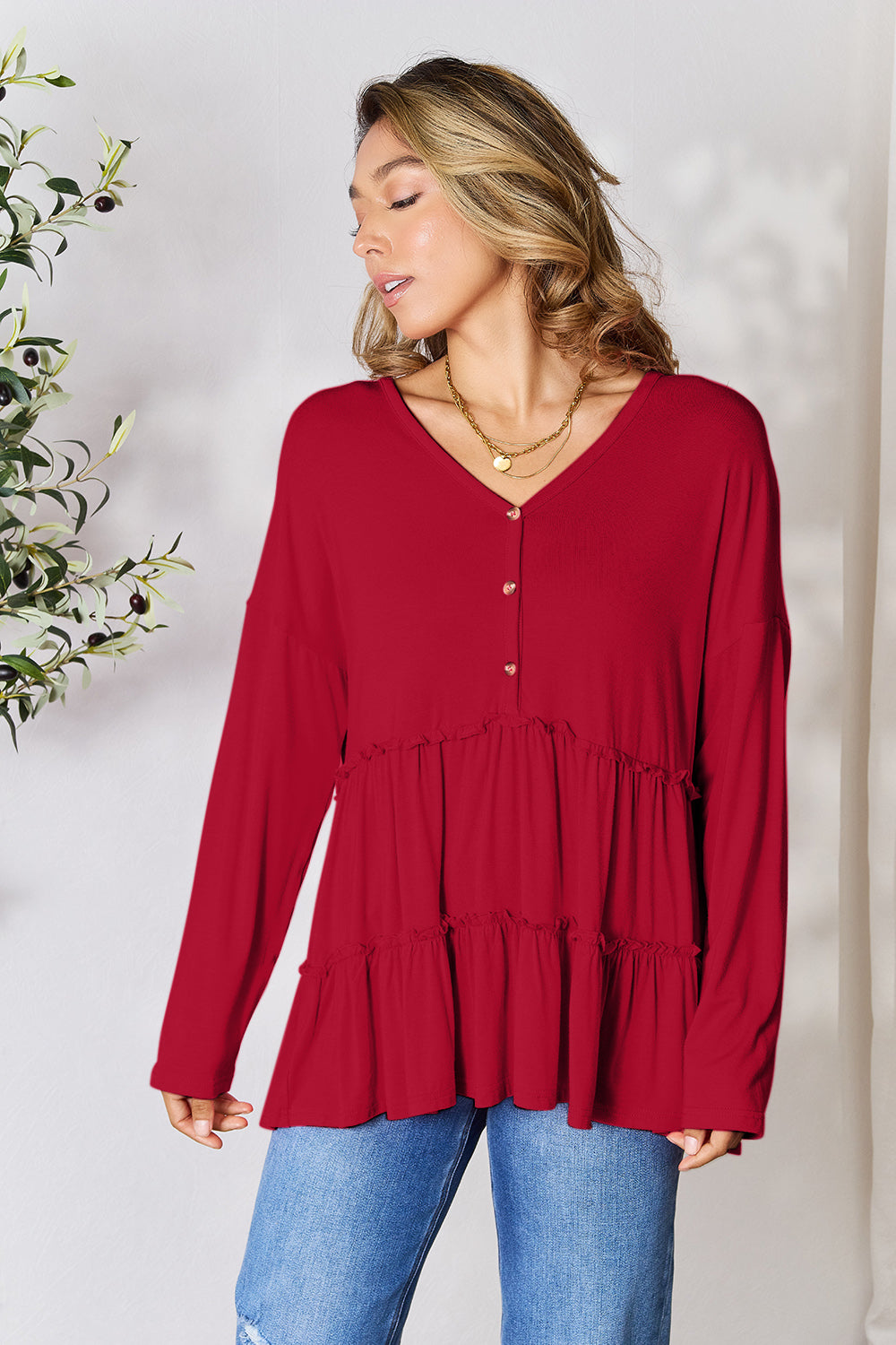 Double take half button long sleeve ruffle hem blouse