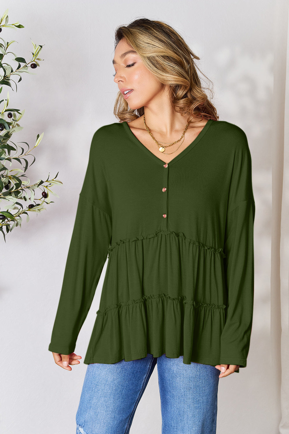 Double take half button long sleeve ruffle hem blouse