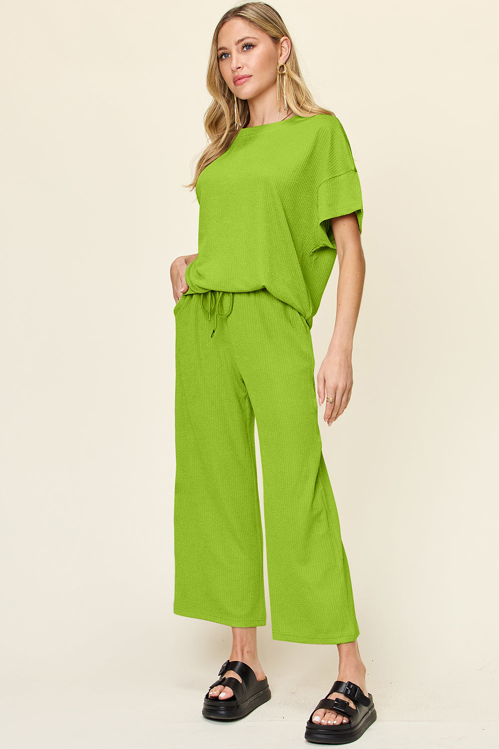 Double take full size texture round neck short sleeve t-shirt and wide leg pants