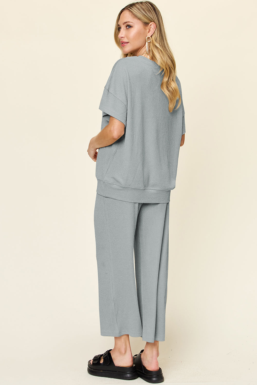 Double take full size texture round neck short sleeve t-shirt and wide leg pants