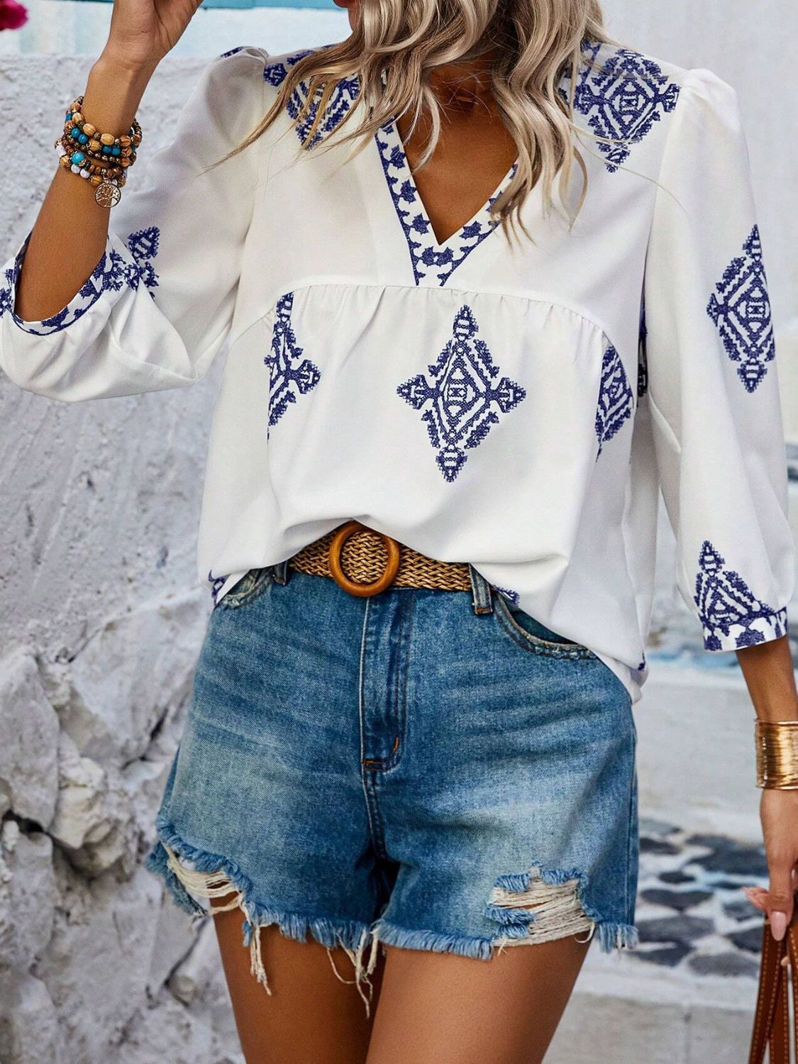 Printed v-neck three-quarter sleeve blouse