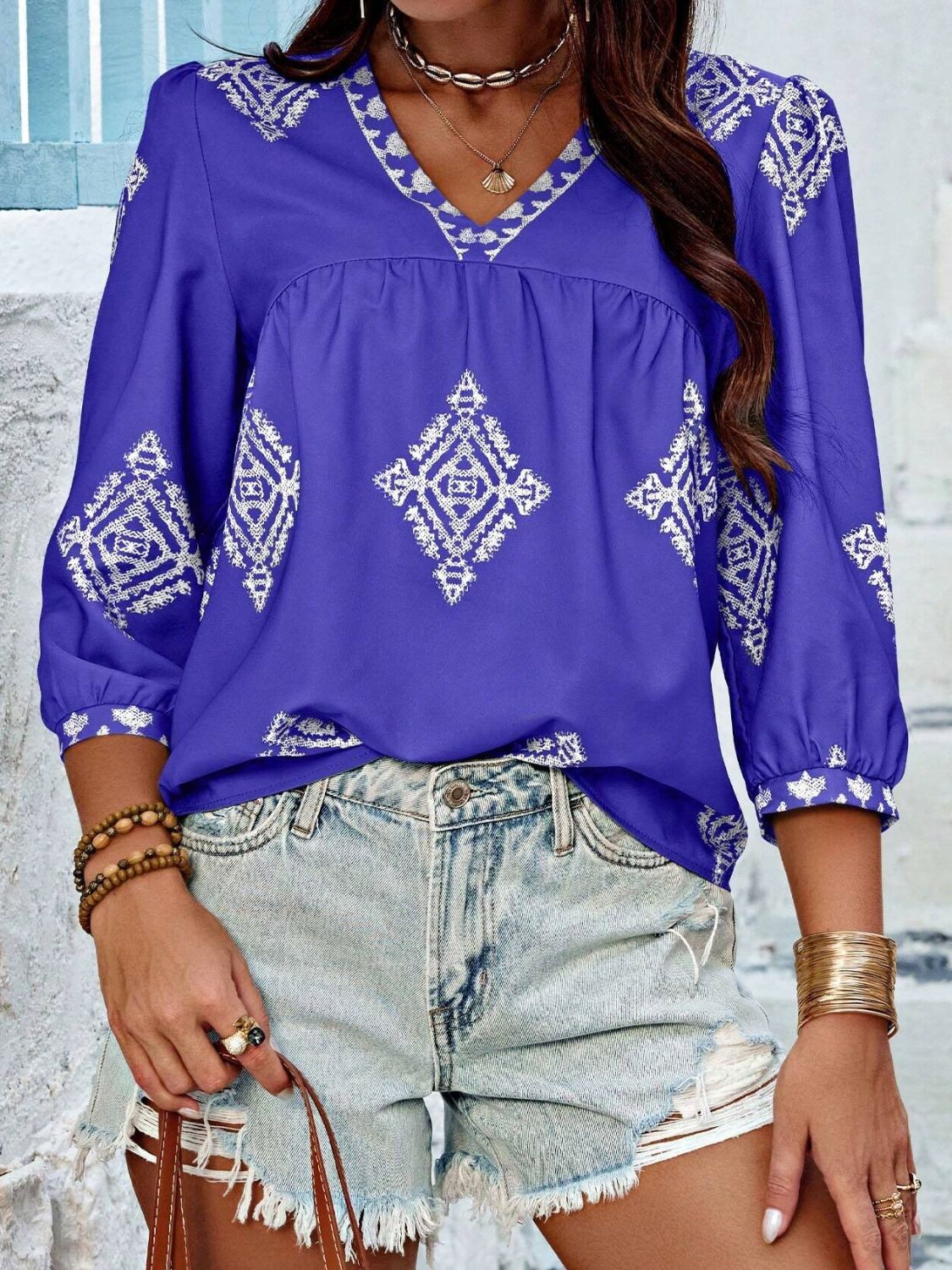 Printed v-neck three-quarter sleeve blouse