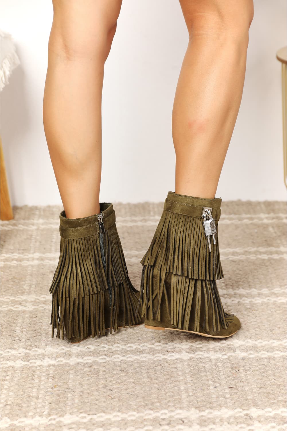 Legend women’s tassel wedge heel ankle booties