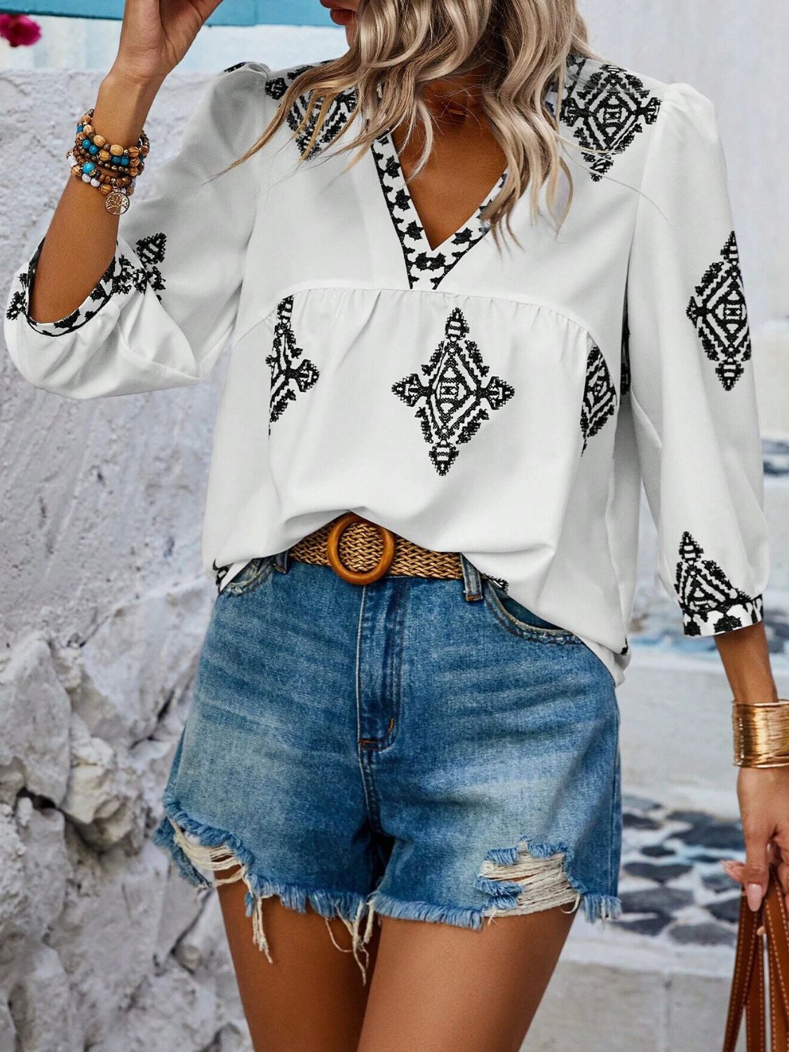 Printed v-neck three-quarter sleeve blouse