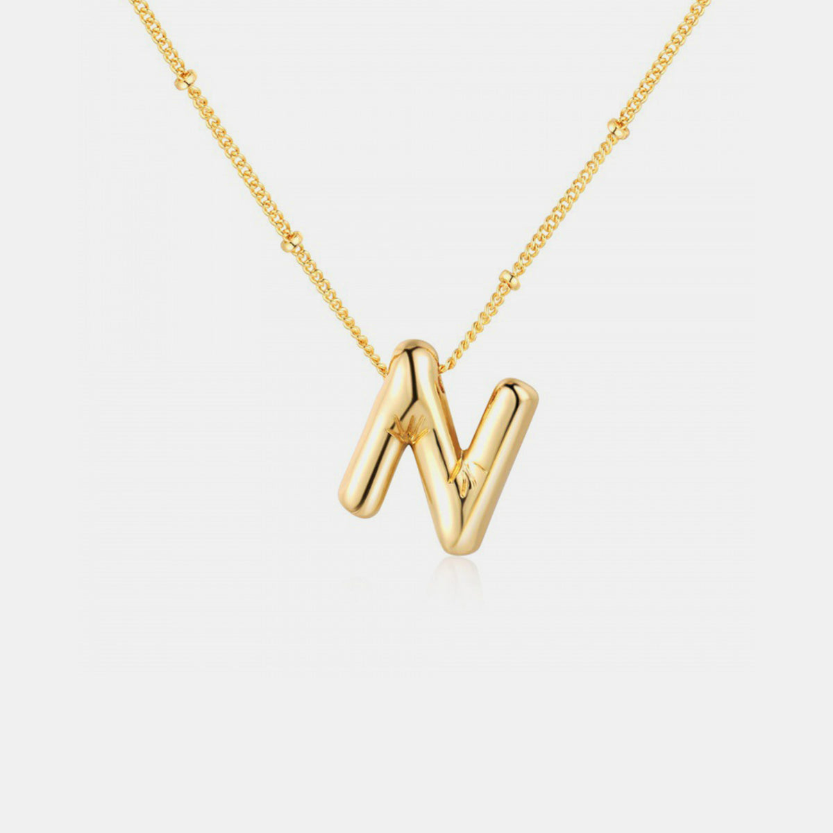 Gold-plated bubble initial necklace - style n / one size