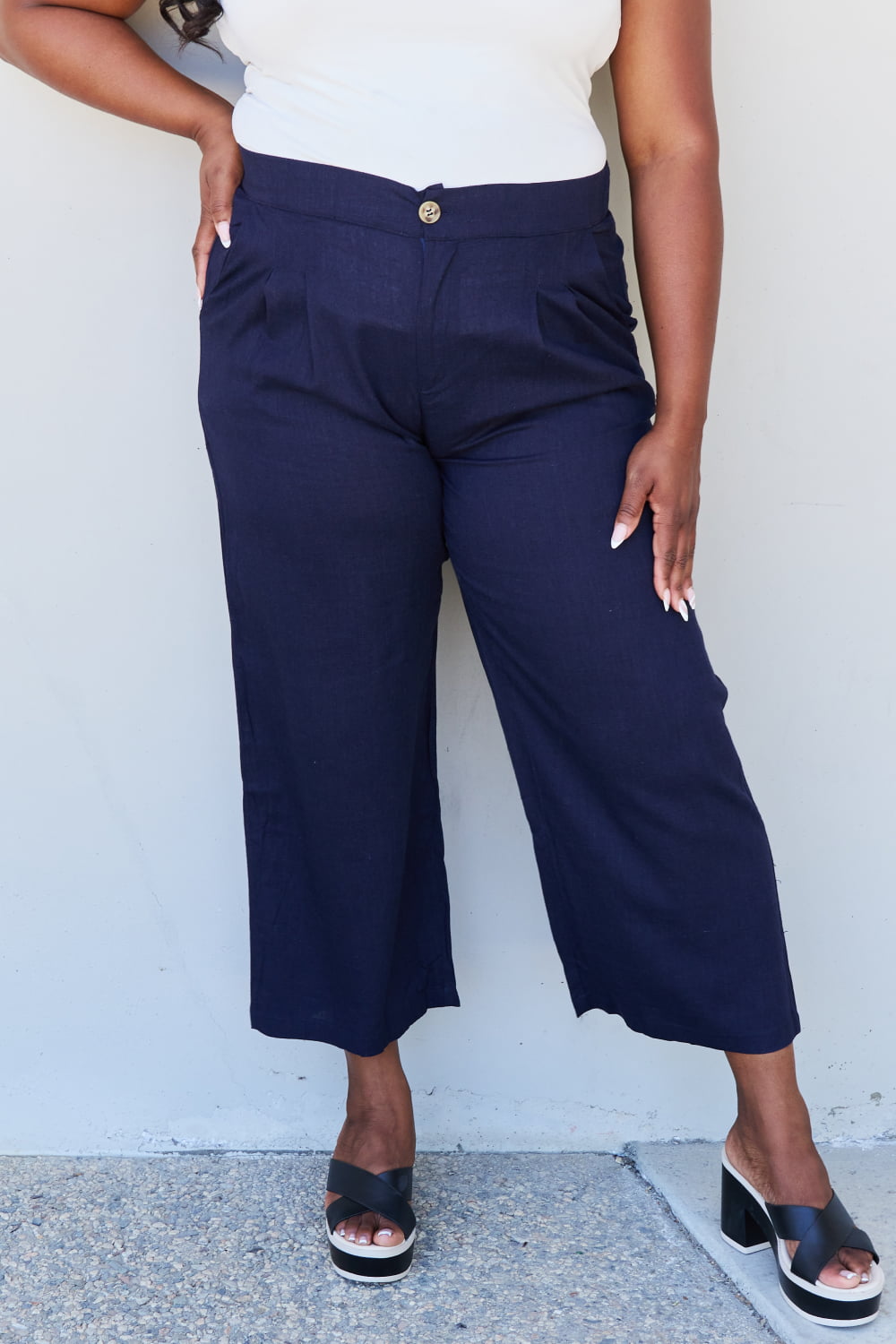 And the why in mix full size pleated detail linen pants in dark navy