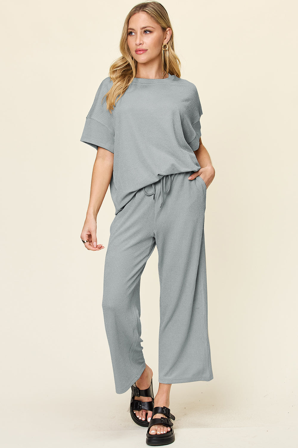 Double take full size texture round neck short sleeve t-shirt and wide leg pants