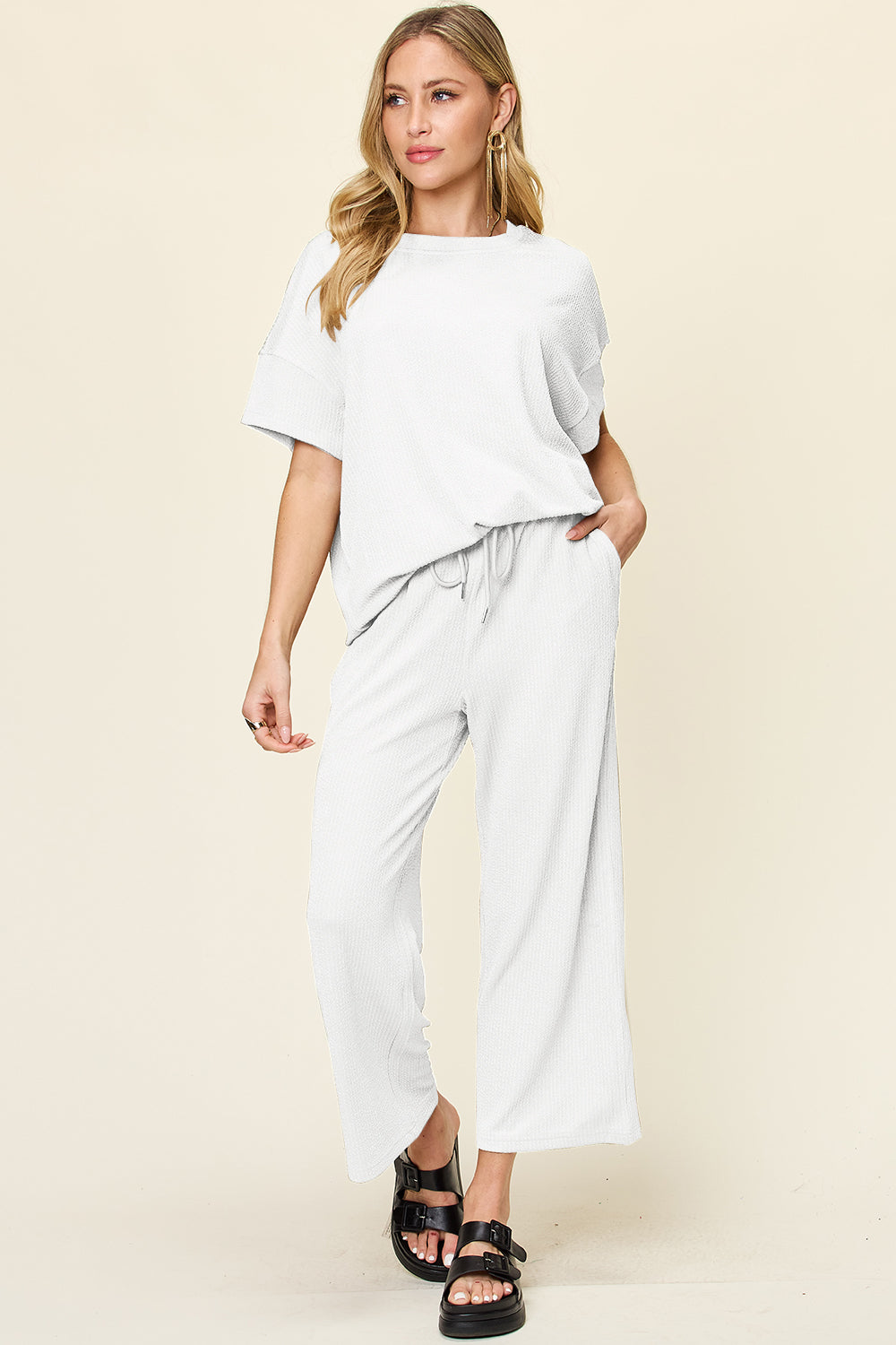 Double take full size texture round neck short sleeve t-shirt and wide leg pants