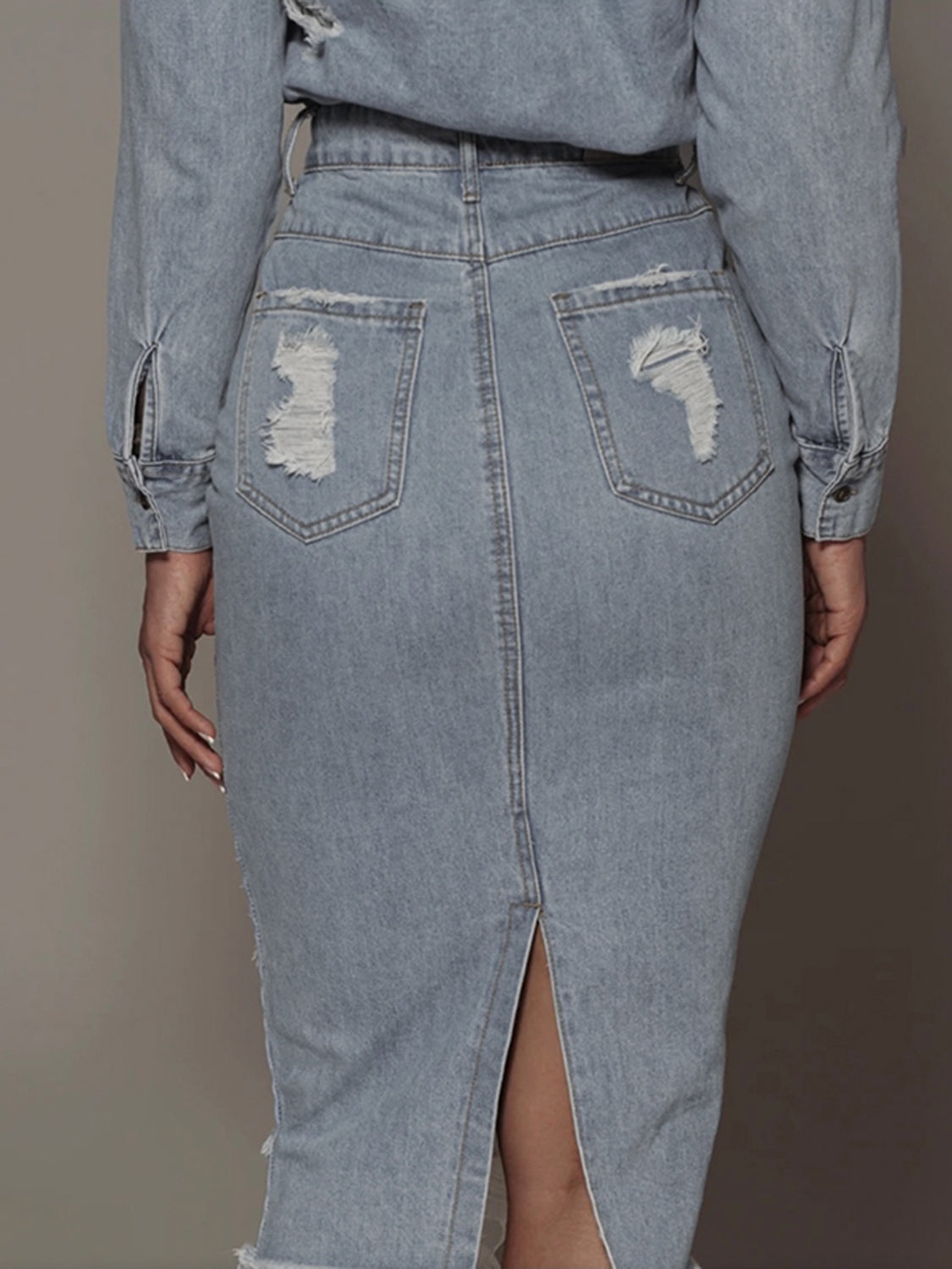 Distressed slit denim skirt