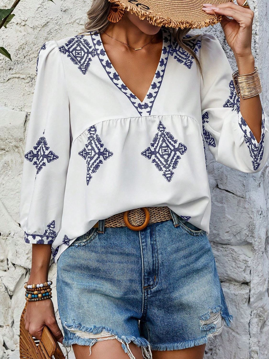 Printed v-neck three-quarter sleeve blouse