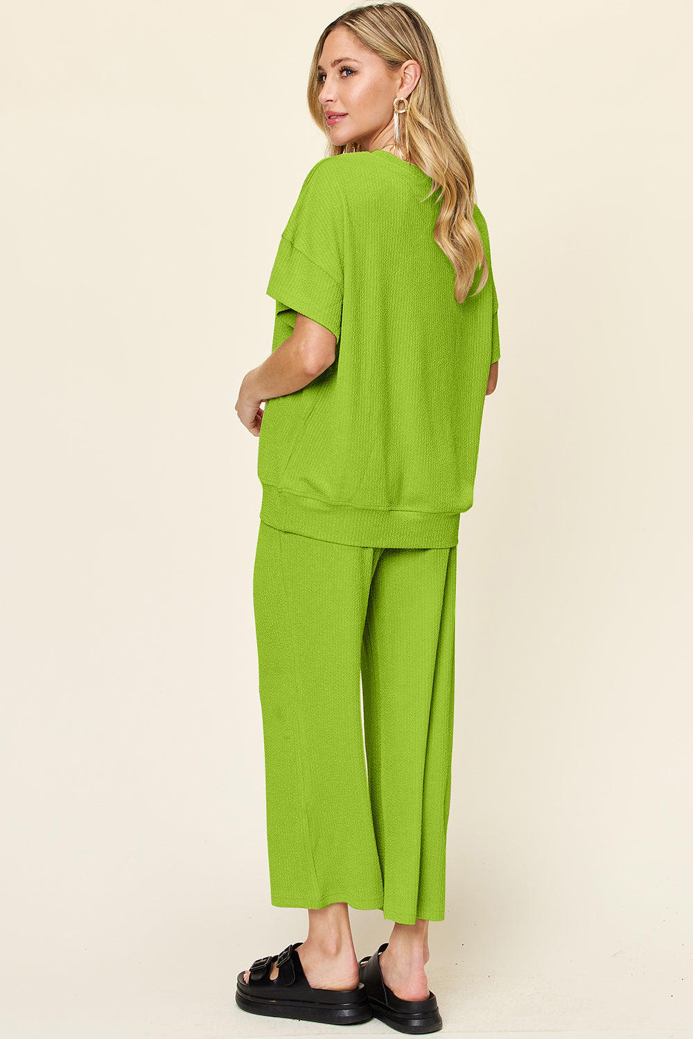 Double take full size texture round neck short sleeve t-shirt and wide leg pants