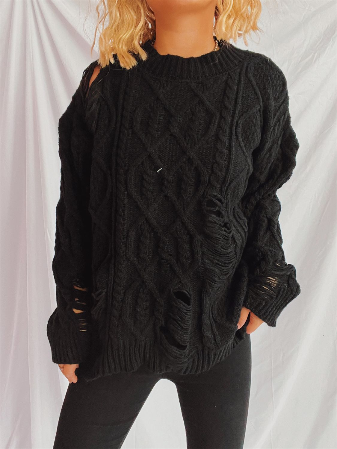 Distressed cable-knit round neck long sleeve sweater - black / one size