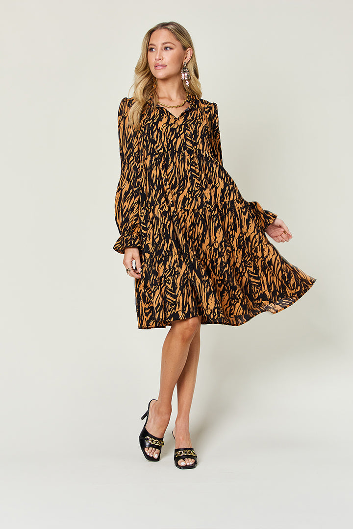 Double take full size printed ruffle hem long sleeve dress