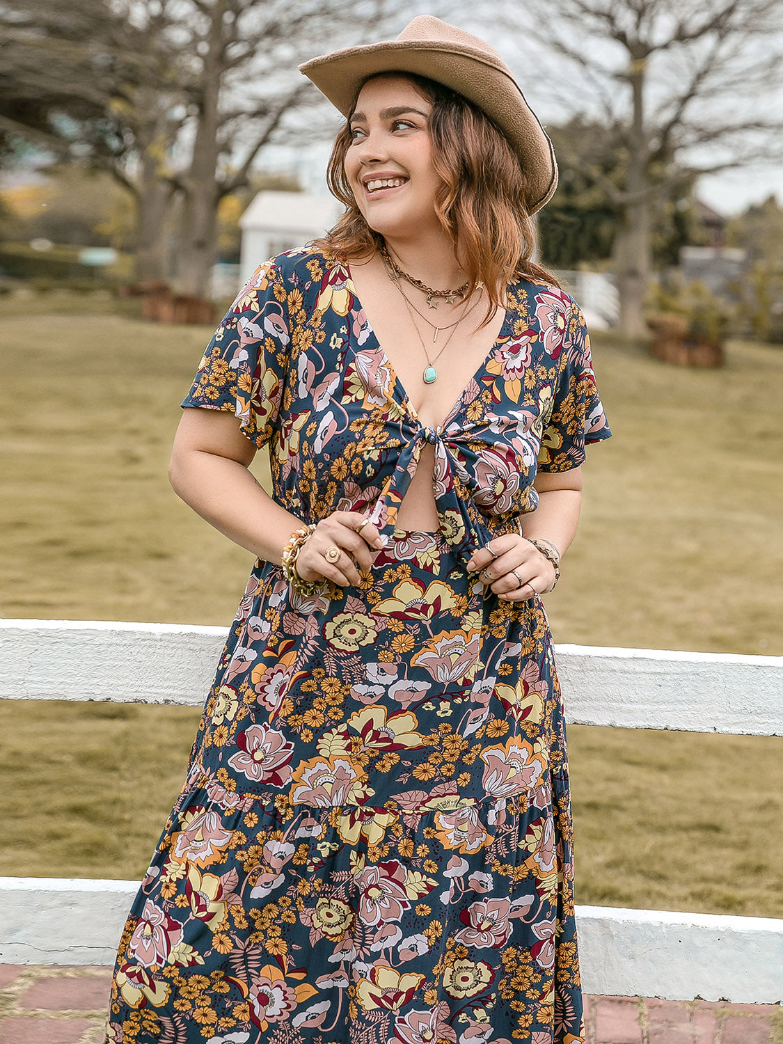 Plus size tied printed short sleeve midi dress