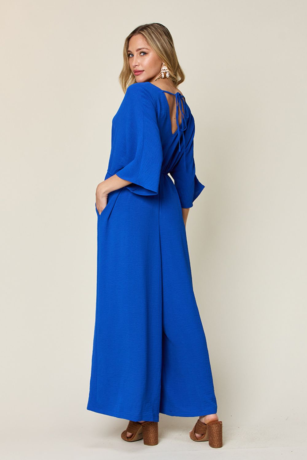 Double take full size surplice wide leg jumpsuit with pockets