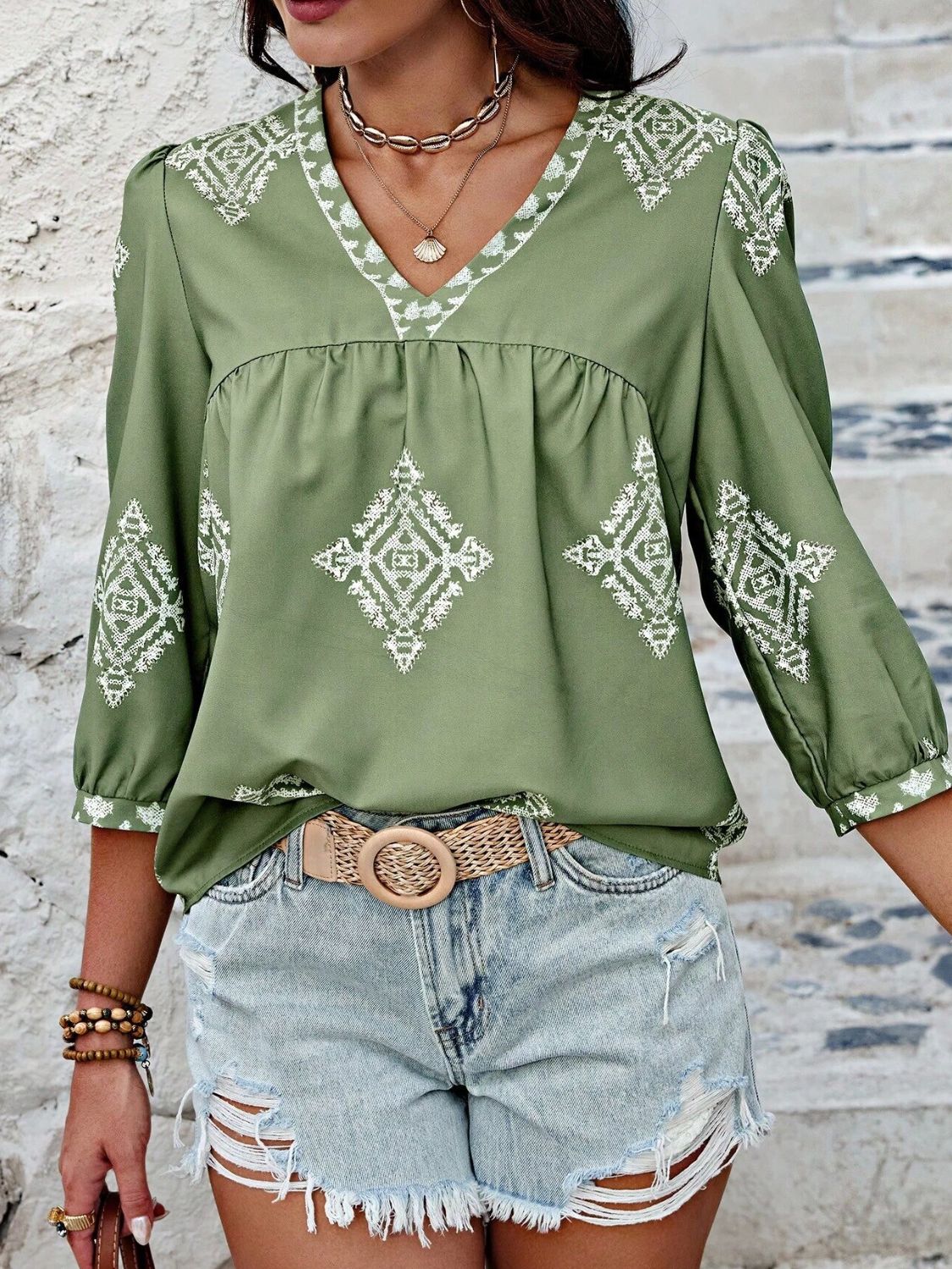 Printed v-neck three-quarter sleeve blouse