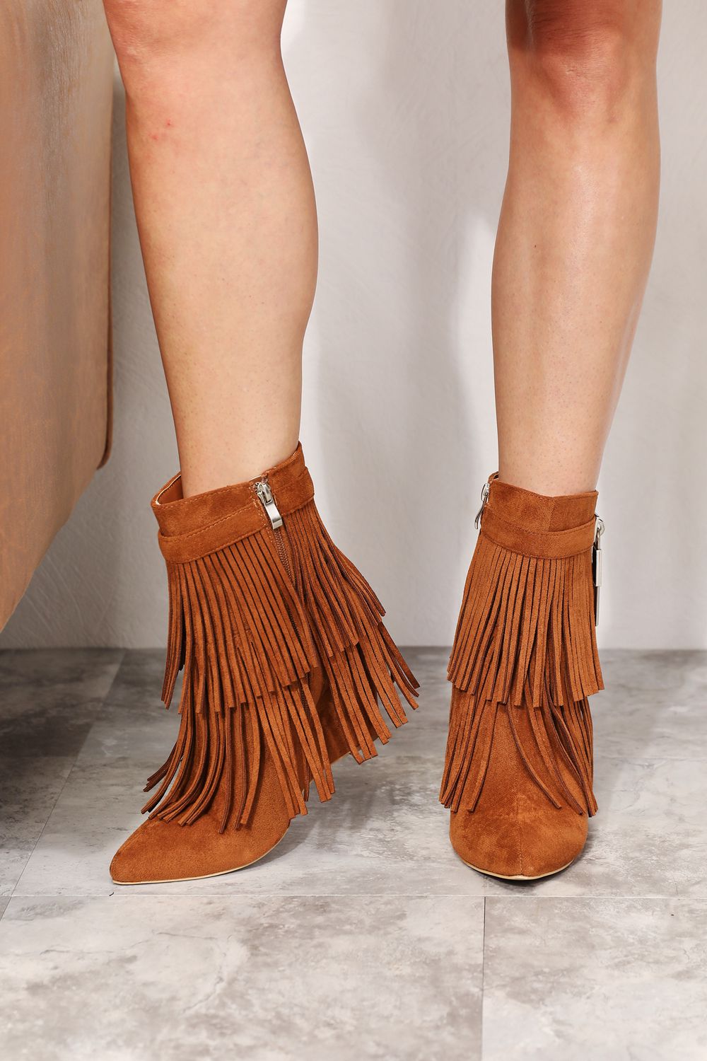 Legend women’s tassel wedge heel ankle booties - caramel / 6